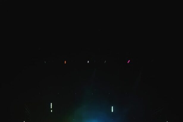 people standing on stage during nighttime