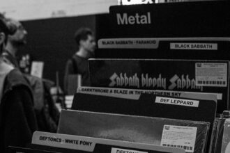 A bunch of records that are sitting on a table