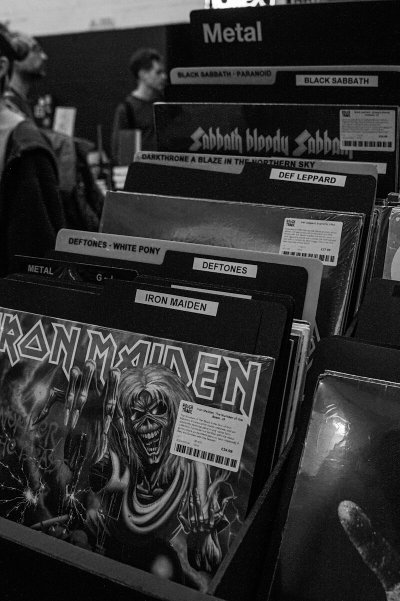 A bunch of records that are sitting on a table